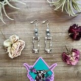 White magensite and terahertz stone dangle earrings